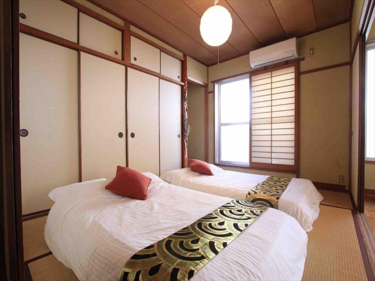 Goraku Shinfu-Kae Apartman Oszaka Kültér fotó