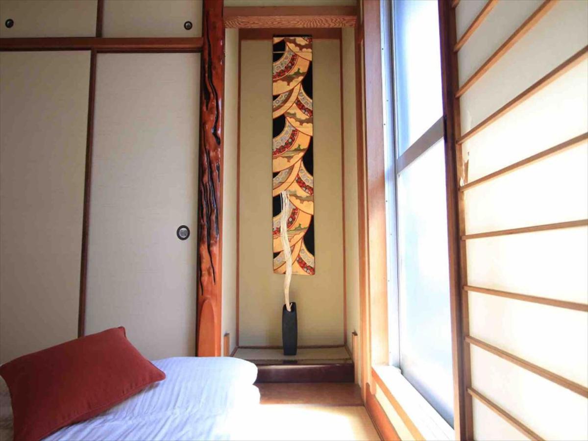 Goraku Shinfu-Kae Apartman Oszaka Kültér fotó